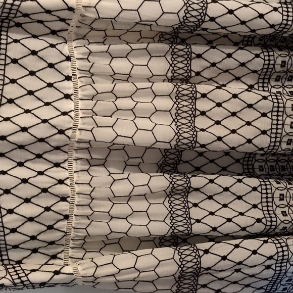 The Gentle Fawn Dress: A Stunning Combination of Elegance and Style - Picture 5 of 16